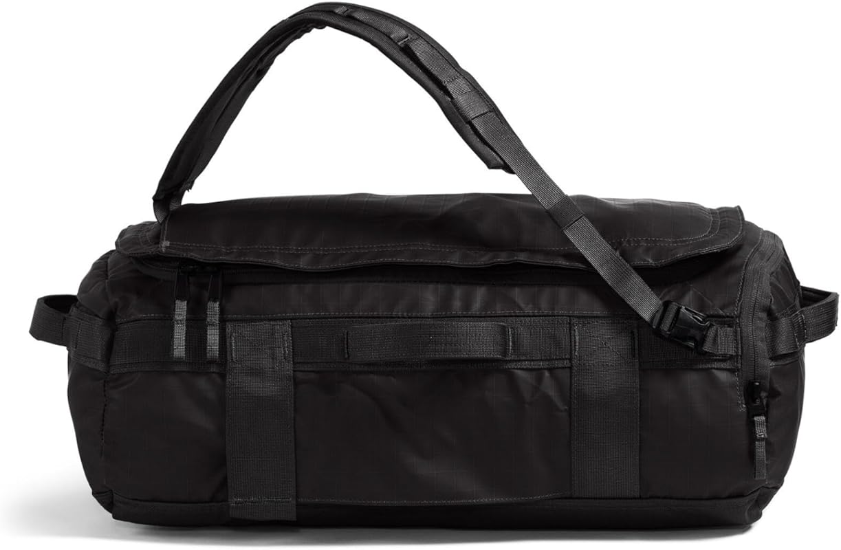 The North Face Base Camp Voyager 32L Rugged Duffel Bag for Travel and 